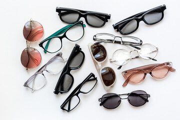 Group of glasses. Fashionable assortment of glasses in various styles and colors.