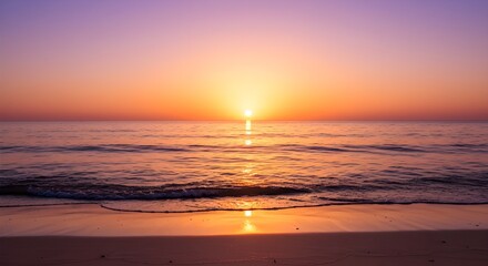 Naklejka premium Sunset over the ocean horizon with warm reflections on the water and footprints in the sand, concept of tranquility, natural beauty, and peaceful seaside moments.