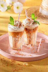 Delicious ice coffee in summer sunny day.