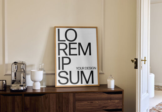 Mockup Of Vertical Customized Framed Poster On Sideboard