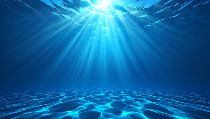 Underwater scene with sunbeams piercing the clear blue water creating dappled light patterns on the ocean floor