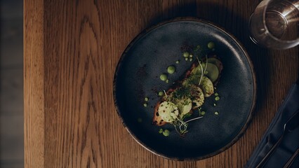 Cucumber & Microgreen Toast on Blue Plate with Green Pur&eacute;e Dots