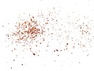 Sprinkle of chopped hot red chili peppers or paprika, paprika or red chili powder isolated on white background. Crushed red chili or chopped paprika. A pile of ground red chili or paprika.