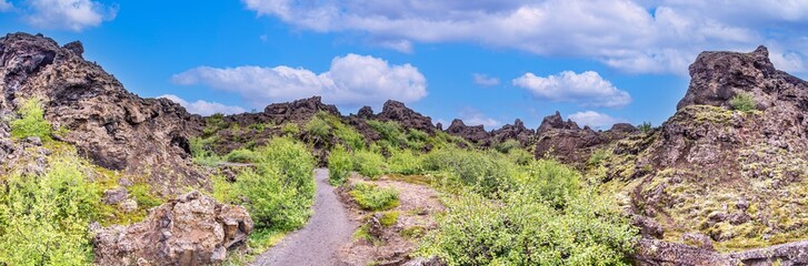 Panoramic view Dimmuborgir lava fields Iceland under blue sky