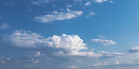 Blue sky with beautiful white clouds. Sky with cumulus and cirrocumulus clouds. Panoramic image of...