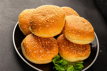 Bun burger puffy soft buns baking fresh delicious gourmet food background on the table rustic food...
