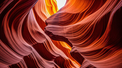 Antelope Canyon: Dramatic Red Rock Formations, Swirling Textures, Warm Light, Abstract Nature Background.