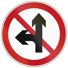 Road sign in China - No proceed straight and left turns