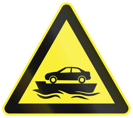Warning road sign in China - Car ferry