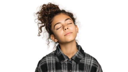 Young girl with curly hair, wearing a flannel shirt, eyes closed, serene expression.