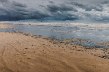 Oil leak in sea coastline after a tanker wreck. Oil fuel polluted and destroy beach. Ecological...