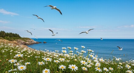 Seagulls soar over a vibrant field of daisies blooming by the ocean under a clear blue sky on a sunny day.