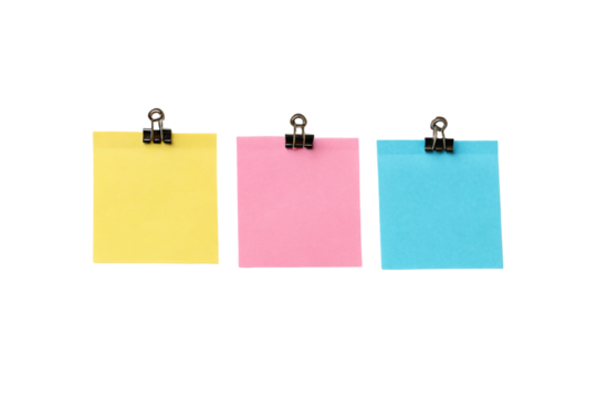 Three colorful square sticky notes with black binder clips attached at top edges, isolated on a transparent background