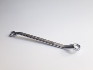 Ring wrench or also known as offset ring wrench and box-end wrench, isolated on white background.