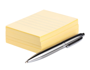 An open spiral notebook with a pen on a blank page in an office setting