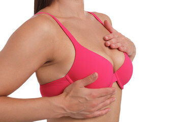 Woman wearing beautiful pink bra on white background, closeup