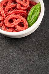 Salami snack mold brezel sausage mini fresh delicious gourmet food background on the table rustic food top view copy space