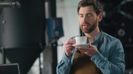 Smiling Caucasian man cafe barista smell fresh aroma caffeine coffee roasting production male small business owner guy in uniform holding cup espresso cappuccino drink serving order in coffeehouse