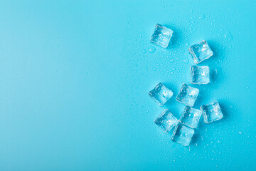 Mint and ice on texture background. Green fresh mint and ice cube. Mint leaves, ice cube and water...