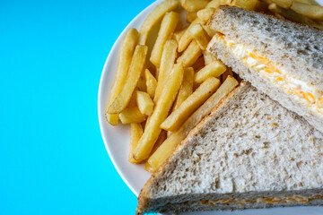London UK, July 14 2025, Freshly Made Tasty Cheese And Onion Sandwich With Chips Or Fries