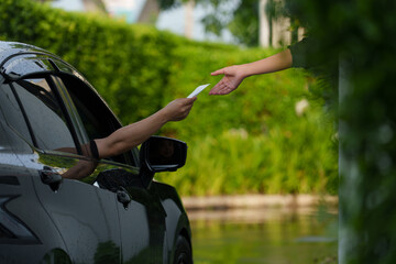 Scan and pay for food, pick up food from a drive-thru counter and take it to eat at home and at work.