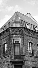 Red brick house on a street in the city