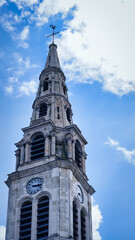 Medieval church tower with colorful stained glass windows