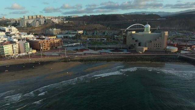 Aerial view of Las Canteras beach in Las Palmas de Gran Canaria at sunset with Alfredo Kraus Auditorium