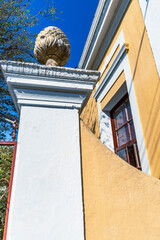 Detail of  facade of antique  house on historic center  of  Cambuy city, Minas Gerais state, Brazil