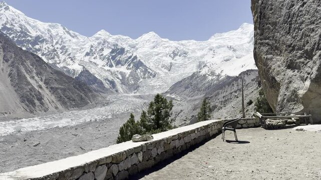 4K 60FPS Footage of walking toward a rock at Beyal Camp, Fairy Meadows, with Nanga Parbat and Pakistani Flag in Background &ndash; Sunny Day, Gilgit-Baltistan, Pakistan