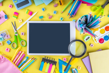 Back to school colorful background containing various school supplies, education accessories for...