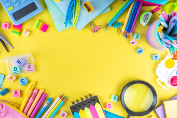 Back to school colorful background containing various school supplies, education accessories for...
