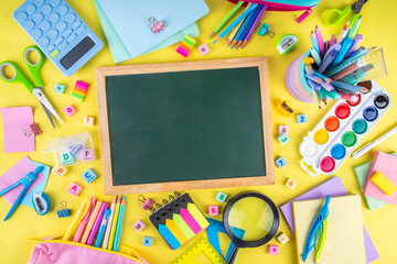 Back to school colorful background containing various school supplies, education accessories for...