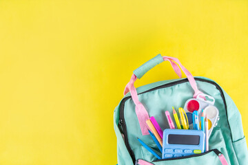 Back to school colorful background containing various school supplies, education accessories for...