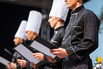 culinary arts graduation ceremony, students receiving certificates