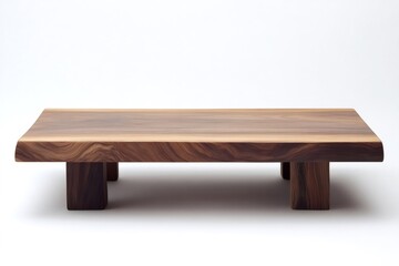 Modern low wooden coffee table with clean edges standing on a white background, showcasing its minimalist design