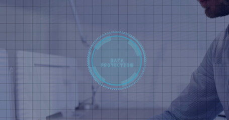 Displaying interface labeled DATA PROTECTION hovering over office desk with computer monitor