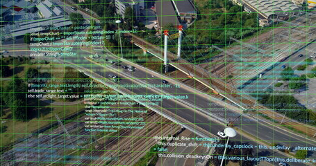Showing highway and rail junction merging curved ramps, with cable-stayed pylons and grid overlay