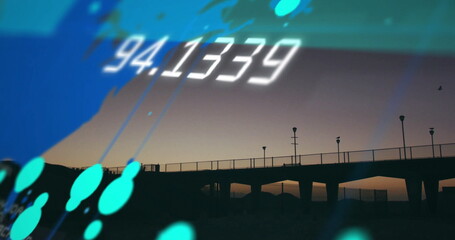 Floating white numeric display and teal shapes gliding over coastal pier at dusk, with lampposts