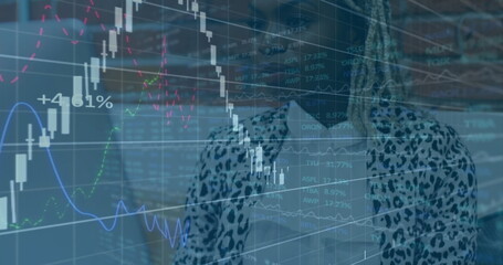 Standing woman in leopard blazer analyzing financial overlays in office with percentages