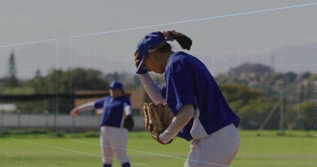 Adjusting cap, woman baseball player in blue uniform standing on field, with glove, copy space