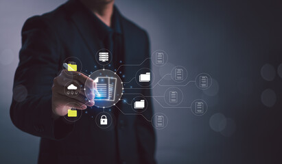 Concept of Document Management System (DMS) software for archiving and managing corporate file data,Businessman holding pen tapping on paper icon for document file storage or online document database