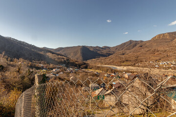 Autumn view of the mountainous area of the Caucasus. Colorful autumn landscape. Autumn forest on...
