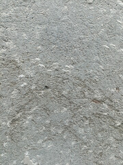 Rough gray granite texture with speckles.

