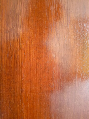 Smooth reddish-brown wood texture with fine grain.

