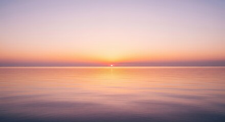 Fototapeta premium Beautiful Sunset Over The Calm Ocean Horizon
