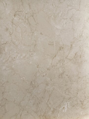 Natural stone texture with pale cream color and granular details.

