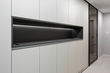 There is a piece of furniture in the hallway where you can put various EDCs