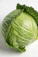 Obraz premium Whole Green Cabbage Head Isolated on White