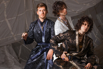 Charismatic guys in oriental costumes. Arabic or Turkish style, costume photography